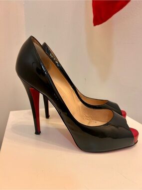 Christian Louboutin shoes. Black Patent leather peep-toe 5” heels. Size 10
